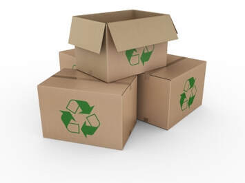 Cajas de cartón utilizadas en trasporte de mobiliario de jardín en la costa del sol